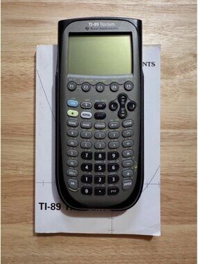 TI-89 Titanium Graphing Calculator With Cover & Manual By Texas Instruments
